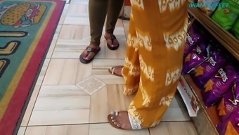 Candid ebony feet at the store