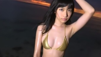 Oiled up gold bikini wet fetish (non-nude)