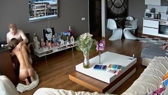 Blowjob spied in living room