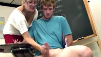 Shorthaired blonde gilf teacher strokes his hard cock