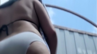 Curvaceous white chick in the beach cabin filmed bottomless