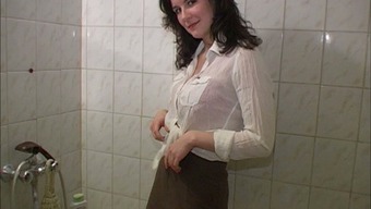 Mesmerizing brunette Russian beauty in the shower room
