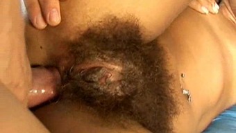 A chick with an extremely hairy pussy gets fucked in the ass