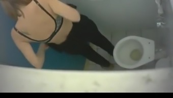 Girl with small tattoos spied in public toilet
