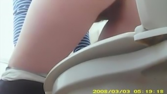 Redhead teen spied in public toilet pissing