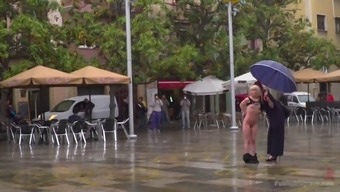 Tall Mistress humiliates a petite teen on the public square