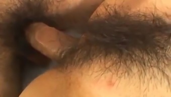 Young Japanese fucked deep in her hairy pussy
