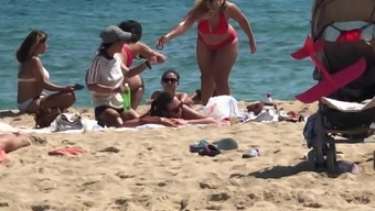 Teen girl takes bikini off for massage at beach