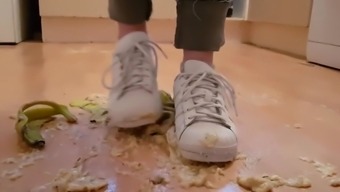 Crushing Juicy Bananas In Well Worn White Adidas Trainers