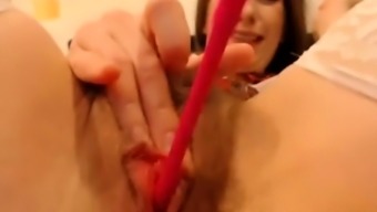 Cute redhead schoolgirl rubs clit on cam
