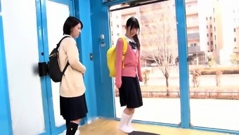 Two lovely Asian schoolgirls getting pounded hard together
