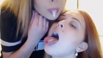 Lesbians Kissing And Swapping Sperm on cam