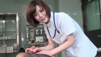 Subtitled cfnm japanese female doctor gives patient handjob