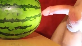 eating and playing with cum after fucking a melon and cumming into a condom