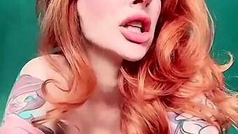 Tattooed redhead milf shows off her beautiful tits on webcam