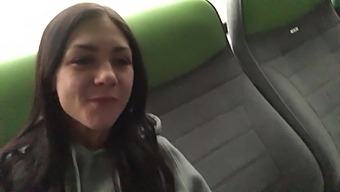 German teen gives a handjob to a chubby penis on a public bus