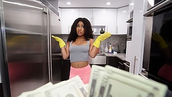 Black housemaid gives a hot blowjob and gets paid for it