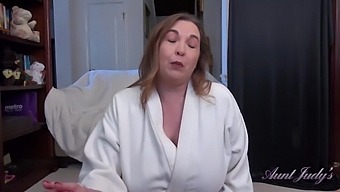 Seductive step-aunt Denise gives you a sensual handjob in this POV video