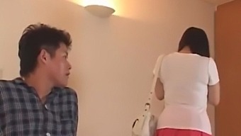 Asian mother-in-law gets a blowjob in customs