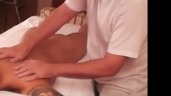 Muscular teen couple enjoys a sensual gay massage